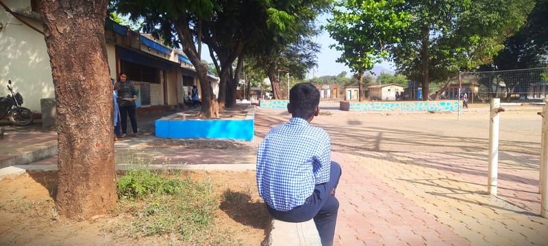 Mangesh Valvi in a pensive mood at Thane district's Betegaon Ashram School.