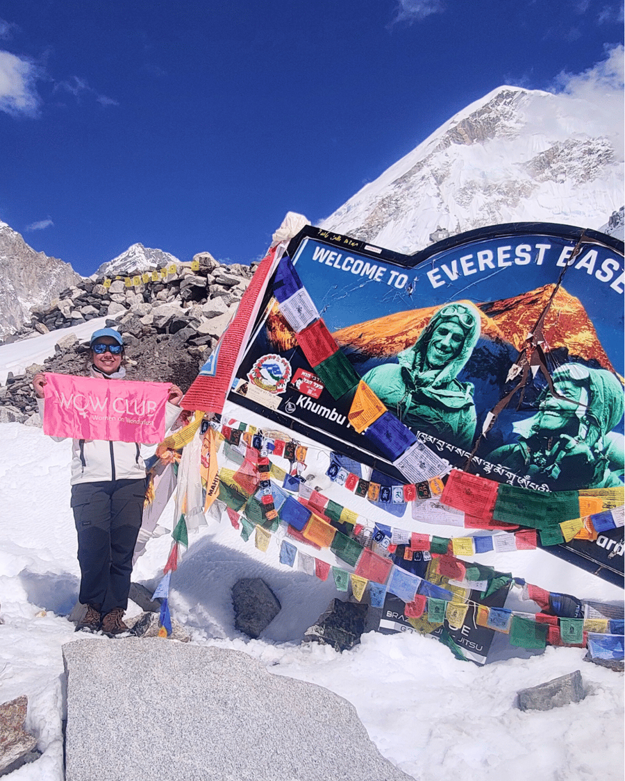 Prayer flags at the Everest Base Camp sign