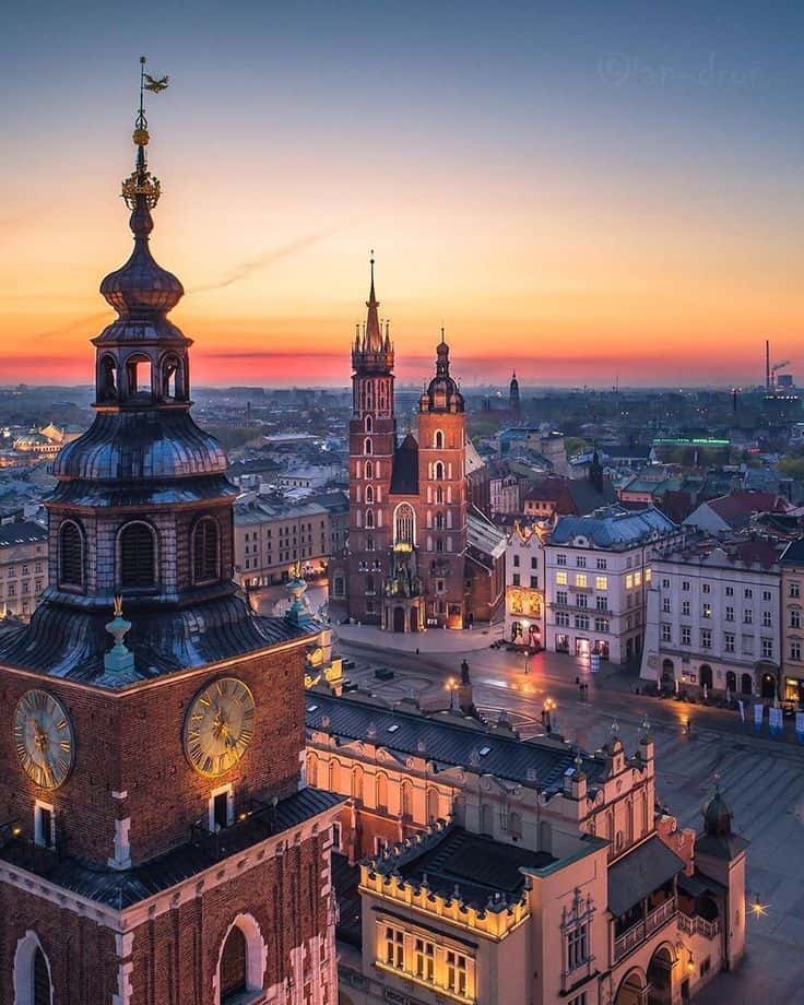 Old-town spires at sunset in Kraków, Poland