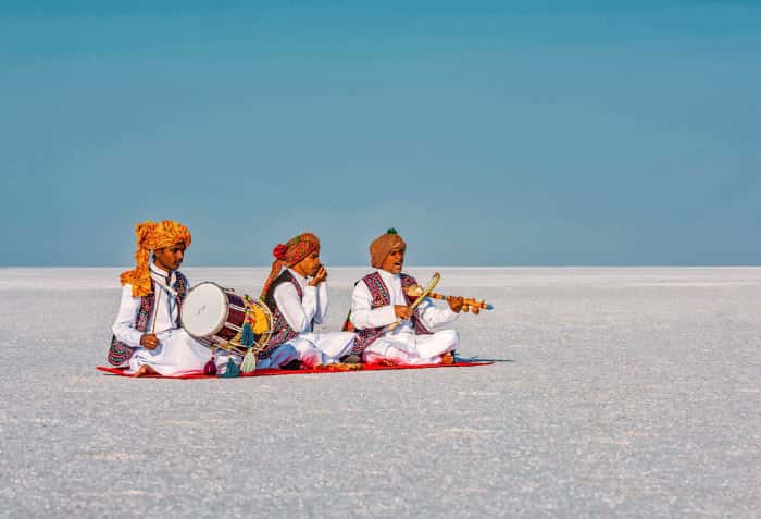 Folk musicians on the white salt desert of the Rann of Kutch